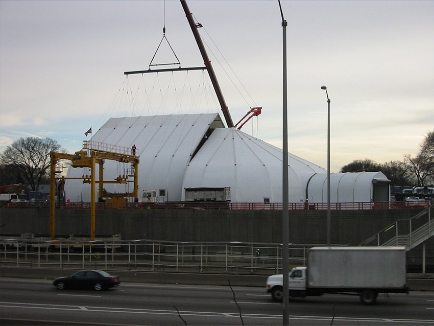 Crane liftable fabric building